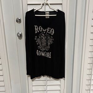 Black Graphic Top with Rodeo Cowgirl Graphic.  Sparkly accents.